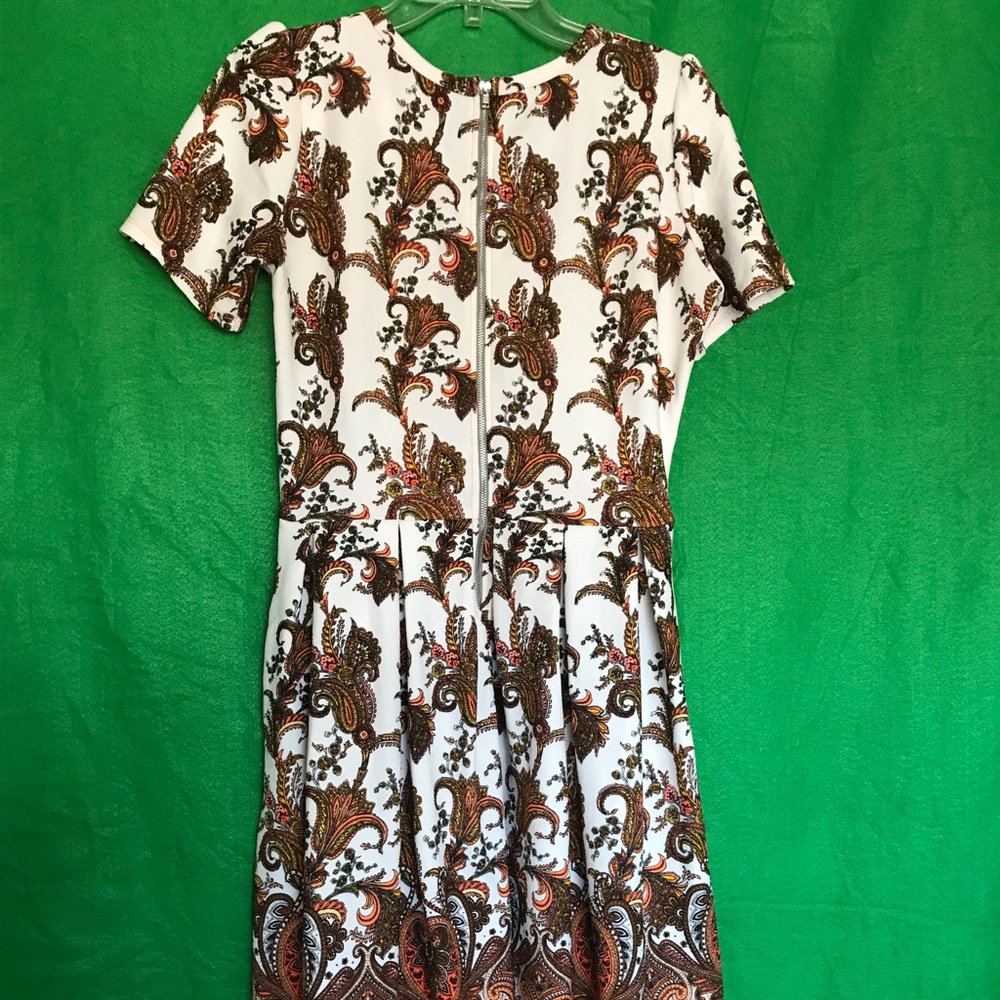 Lula roe white and orange print casual dress.